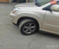 Желтый Лексус РХ, объемом двигателя 3.46 л и пробегом 163 тыс. км за 12800 $, фото 3 на Automoto.ua
