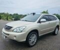Желтый Лексус РХ, объемом двигателя 3.31 л и пробегом 222 тыс. км за 12500 $, фото 1 на Automoto.ua