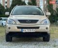 Желтый Лексус РХ, объемом двигателя 3.3 л и пробегом 224 тыс. км за 11800 $, фото 1 на Automoto.ua