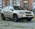 Желтый Лексус РХ, объемом двигателя 3.3 л и пробегом 224 тыс. км за 11800 $, фото 1 на Automoto.ua