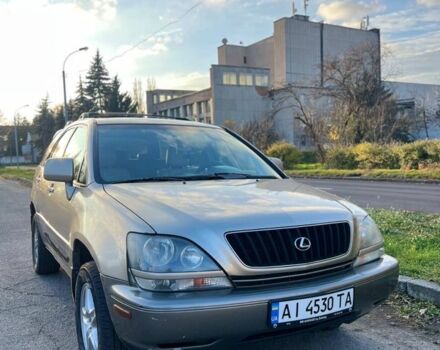 Желтый Лексус РХ, объемом двигателя 3 л и пробегом 3 тыс. км за 5500 $, фото 1 на Automoto.ua