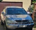 Сірий Лексус РХ, об'ємом двигуна 3 л та пробігом 244 тис. км за 7900 $, фото 1 на Automoto.ua