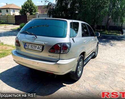 Серый Лексус РХ, объемом двигателя 3 л и пробегом 220 тыс. км за 6450 $, фото 2 на Automoto.ua