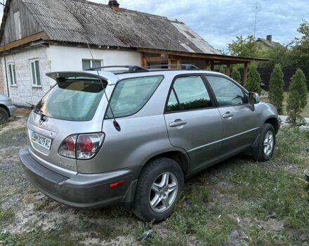 Серый Лексус РХ, объемом двигателя 3 л и пробегом 178 тыс. км за 4628 $, фото 2 на Automoto.ua