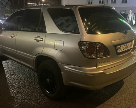 Серый Лексус РХ, объемом двигателя 3 л и пробегом 332 тыс. км за 6999 $, фото 2 на Automoto.ua