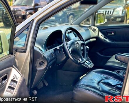 Серый Лексус РХ, объемом двигателя 3 л и пробегом 290 тыс. км за 5999 $, фото 3 на Automoto.ua