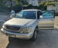 Сірий Лексус РХ, об'ємом двигуна 3 л та пробігом 284 тис. км за 7000 $, фото 1 на Automoto.ua