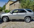 Серый Лексус РХ, объемом двигателя 3 л и пробегом 276 тыс. км за 10700 $, фото 1 на Automoto.ua