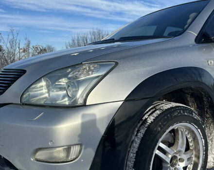 Серый Лексус РХ, объемом двигателя 3 л и пробегом 320 тыс. км за 9500 $, фото 5 на Automoto.ua