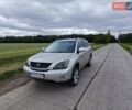 Серый Лексус РХ, объемом двигателя 3.3 л и пробегом 305 тыс. км за 9000 $, фото 1 на Automoto.ua