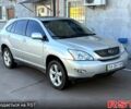 Серый Лексус РХ, объемом двигателя 3 л и пробегом 325 тыс. км за 9500 $, фото 1 на Automoto.ua
