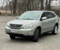 Серый Лексус РХ, объемом двигателя 3.3 л и пробегом 243 тыс. км за 7699 $, фото 1 на Automoto.ua