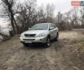 Серый Лексус РХ, объемом двигателя 3.31 л и пробегом 235 тыс. км за 9600 $, фото 2 на Automoto.ua