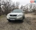 Сірий Лексус РХ, об'ємом двигуна 3.31 л та пробігом 235 тис. км за 9999 $, фото 1 на Automoto.ua