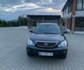 Серый Лексус РХ, объемом двигателя 3.3 л и пробегом 226 тыс. км за 12000 $, фото 1 на Automoto.ua