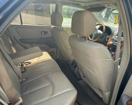 Синий Лексус РХ, объемом двигателя 3 л и пробегом 295 тыс. км за 5500 $, фото 3 на Automoto.ua