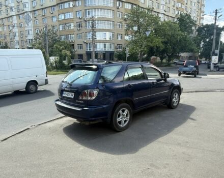 Синий Лексус РХ, объемом двигателя 3 л и пробегом 295 тыс. км за 5500 $, фото 1 на Automoto.ua