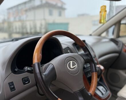 Синий Лексус РХ, объемом двигателя 3 л и пробегом 220 тыс. км за 6700 $, фото 12 на Automoto.ua