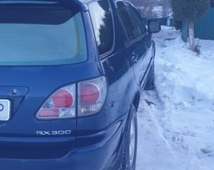 Синий Лексус РХ, объемом двигателя 3 л и пробегом 274 тыс. км за 6500 $, фото 5 на Automoto.ua