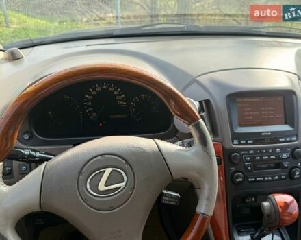 Синий Лексус РХ, объемом двигателя 3 л и пробегом 470 тыс. км за 4500 $, фото 2 на Automoto.ua