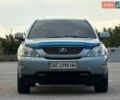 Синий Лексус РХ, объемом двигателя 3.31 л и пробегом 325 тыс. км за 8500 $, фото 2 на Automoto.ua