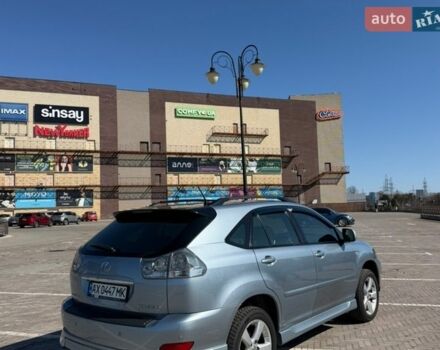 Синий Лексус РХ, объемом двигателя 3.5 л и пробегом 257 тыс. км за 11200 $, фото 2 на Automoto.ua