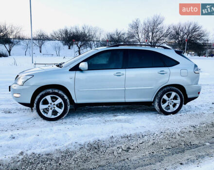 Синий Лексус РХ, объемом двигателя 3.46 л и пробегом 244 тыс. км за 9200 $, фото 3 на Automoto.ua