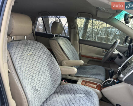 Синий Лексус РХ, объемом двигателя 3.5 л и пробегом 295 тыс. км за 9750 $, фото 51 на Automoto.ua