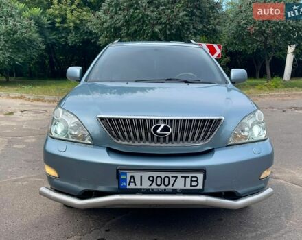 Синий Лексус РХ, объемом двигателя 3.46 л и пробегом 186 тыс. км за 8500 $, фото 1 на Automoto.ua