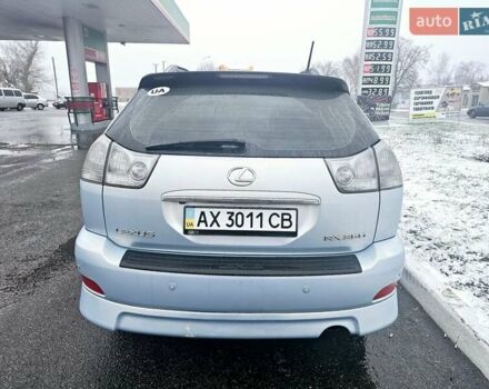 Синий Лексус РХ, объемом двигателя 3.5 л и пробегом 145 тыс. км за 10500 $, фото 2 на Automoto.ua