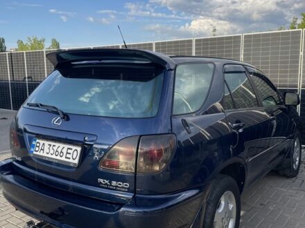 Синій Лексус РХ, об'ємом двигуна 3 л та пробігом 303 тис. км за 5100 $, фото 1 на Automoto.ua