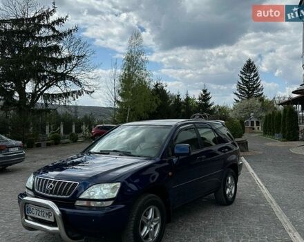 Синий Лексус РХ, объемом двигателя 3 л и пробегом 295 тыс. км за 5950 $, фото 1 на Automoto.ua