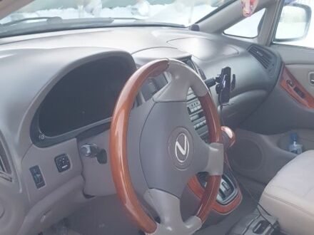 Синий Лексус РХ, объемом двигателя 3 л и пробегом 274 тыс. км за 6500 $, фото 1 на Automoto.ua