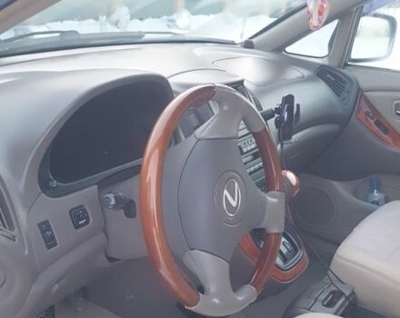 Синий Лексус РХ, объемом двигателя 3 л и пробегом 274 тыс. км за 6500 $, фото 1 на Automoto.ua