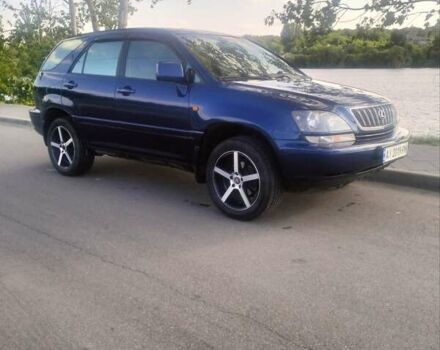 Синий Лексус РХ, объемом двигателя 3 л и пробегом 194 тыс. км за 6100 $, фото 1 на Automoto.ua