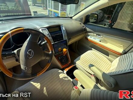 Синий Лексус РХ, объемом двигателя 3.3 л и пробегом 300 тыс. км за 4999 $, фото 1 на Automoto.ua