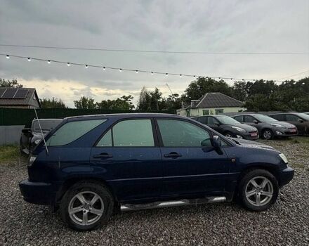 Синий Лексус РХ, объемом двигателя 3 л и пробегом 240 тыс. км за 4999 $, фото 1 на Automoto.ua