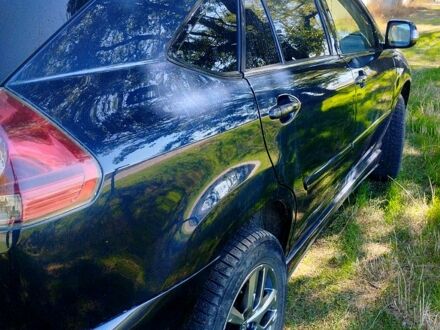 Синий Лексус РХ, объемом двигателя 3.3 л и пробегом 268 тыс. км за 9300 $, фото 1 на Automoto.ua