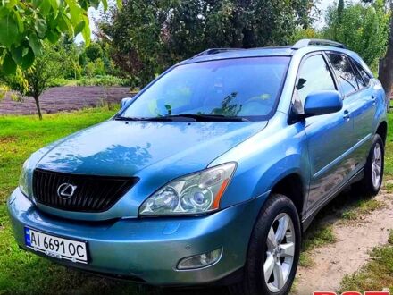 Синій Лексус РХ, об'ємом двигуна 3.3 л та пробігом 279 тис. км за 10300 $, фото 1 на Automoto.ua
