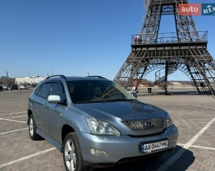 Синий Лексус РХ, объемом двигателя 3.5 л и пробегом 257 тыс. км за 11200 $, фото 1 на Automoto.ua