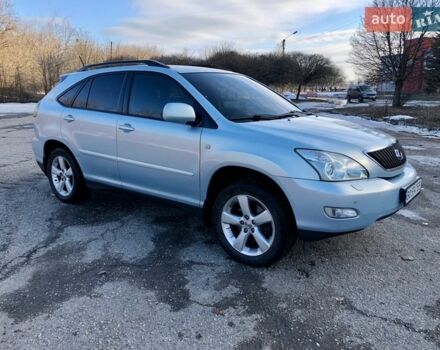 Синий Лексус РХ, объемом двигателя 3.46 л и пробегом 244 тыс. км за 8700 $, фото 1 на Automoto.ua
