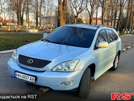 Синій Лексус РХ, об'ємом двигуна 3.5 л та пробігом 257 тис. км за 10100 $, фото 1 на Automoto.ua