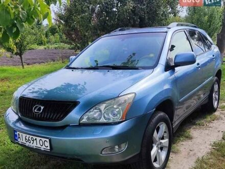 Синий Лексус РХ, объемом двигателя 3.3 л и пробегом 279 тыс. км за 10300 $, фото 1 на Automoto.ua