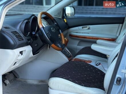 Синий Лексус РХ, объемом двигателя 3.5 л и пробегом 180 тыс. км за 11800 $, фото 1 на Automoto.ua
