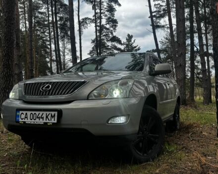 Зеленый Лексус РХ, объемом двигателя 3.46 л и пробегом 301 тыс. км за 12500 $, фото 1 на Automoto.ua