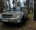 Зеленый Лексус РХ, объемом двигателя 3.46 л и пробегом 301 тыс. км за 12500 $, фото 1 на Automoto.ua