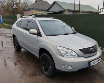 Зеленый Лексус РХ, объемом двигателя 3.5 л и пробегом 298 тыс. км за 10500 $, фото 1 на Automoto.ua