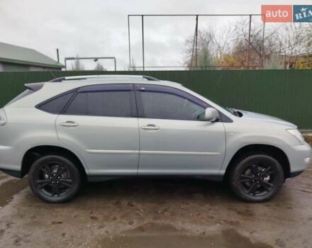 Зеленый Лексус РХ, объемом двигателя 3.5 л и пробегом 298 тыс. км за 10500 $, фото 1 на Automoto.ua