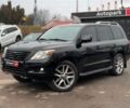 Черный Лексус LX 570, объемом двигателя 57 л и пробегом 305 тыс. км за 23790 $, фото 1 на Automoto.ua