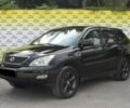 Черный Лексус RX 300, объемом двигателя 30 л и пробегом 144 тыс. км за 11200 $, фото 1 на Automoto.ua